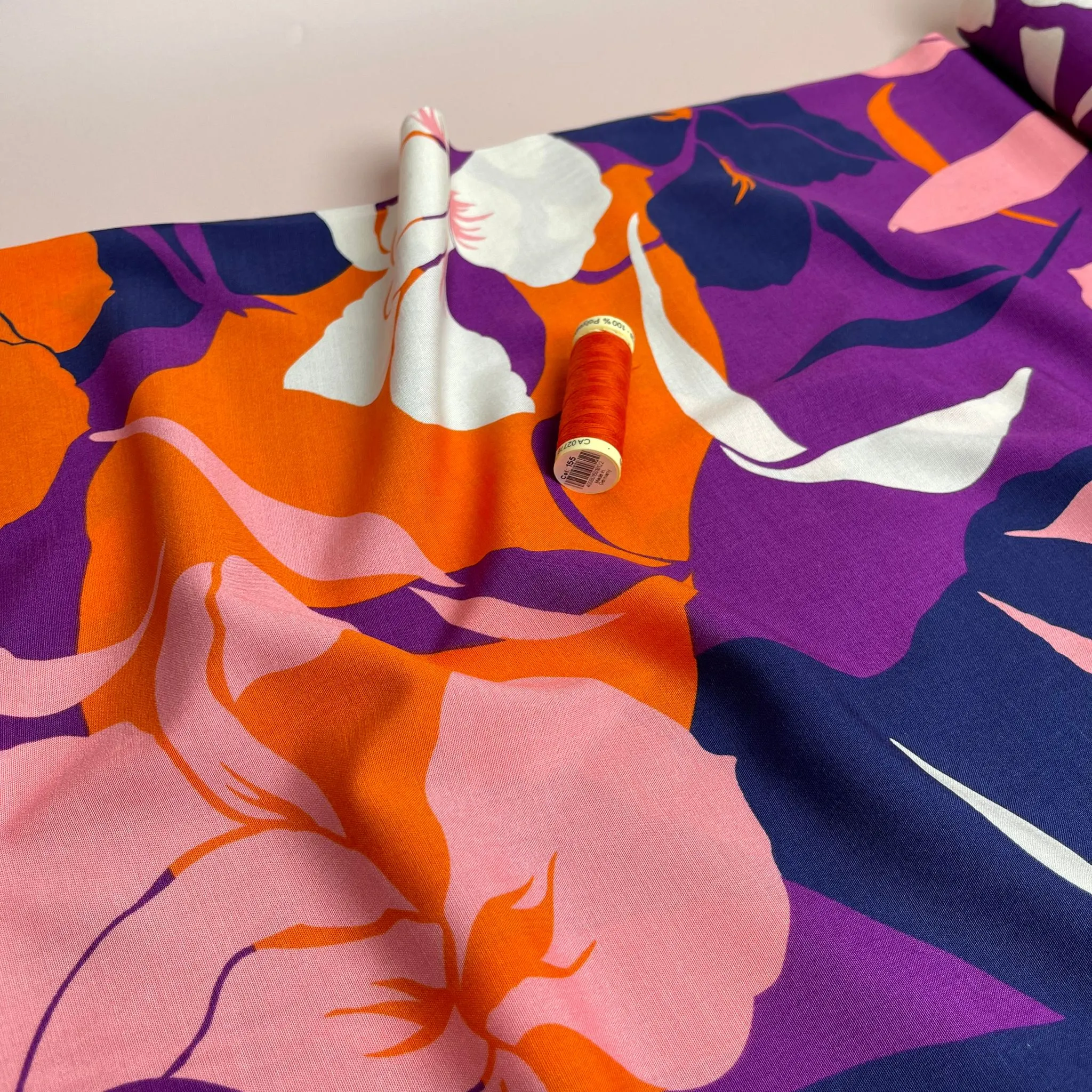 Bold Blooms on Purple Stretch Viscose Poplin Fabric