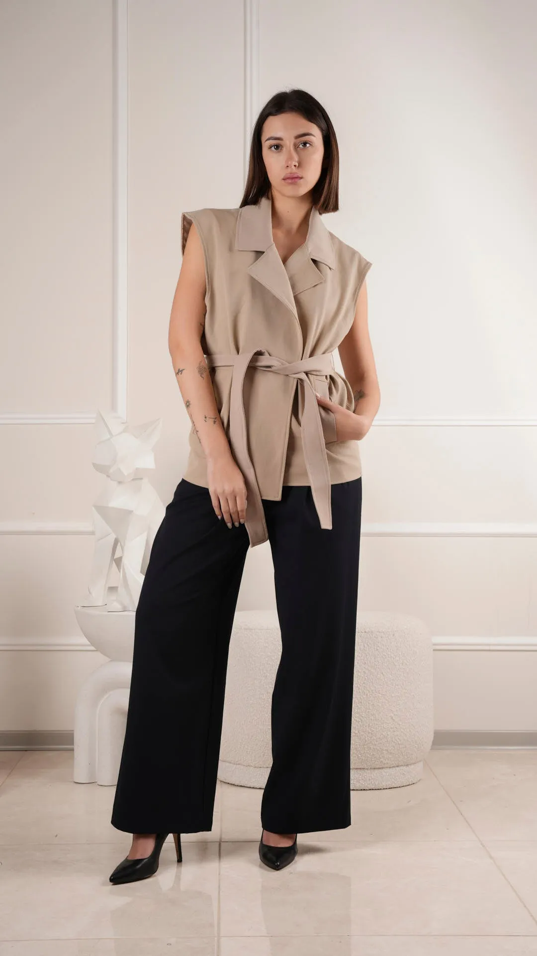 Sophisticated sleeveless blazer top with waist belt wholesale